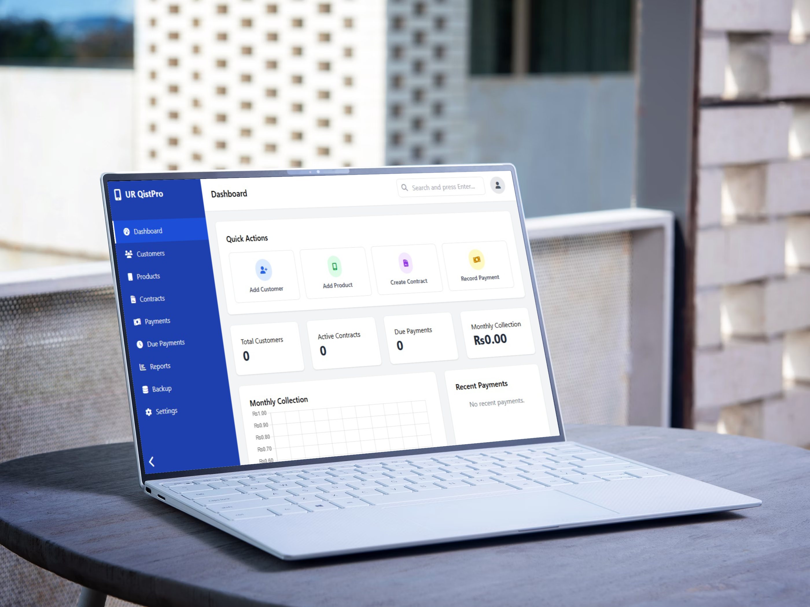 UR QistPro Business Dashboard on a laptop